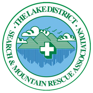 The logo for 'The Lake District Search & Mountain Rescue Association' a circle shape with a 
                        text border all the way around and an image of mountains which also create a reflection in water 
                        beneath. There is a firstaid plus symble in the center